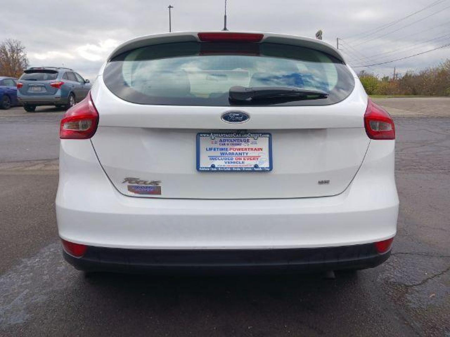 2017 Oxford White Ford Focus SE Hatch (1FADP3K23HL) with an 2.0L L4 DOHC 16V engine, located at 4508 South Dixie Dr, Moraine, OH, 45439, (937) 908-9800, 39.689976, -84.218452 - Photo#5