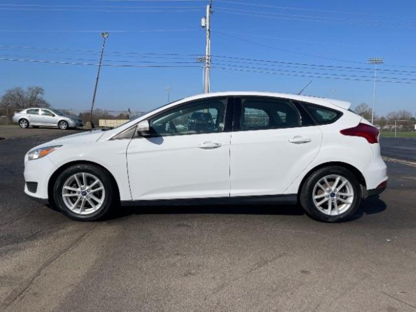 2017 Oxford White Ford Focus SE Hatch (1FADP3K22HL) with an 2.0L L4 DOHC 16V engine, located at 1951 S Dayton Lakeview Rd., New Carlisle, OH, 45344, (937) 908-9800, 39.890999, -84.050255 - Photo#4