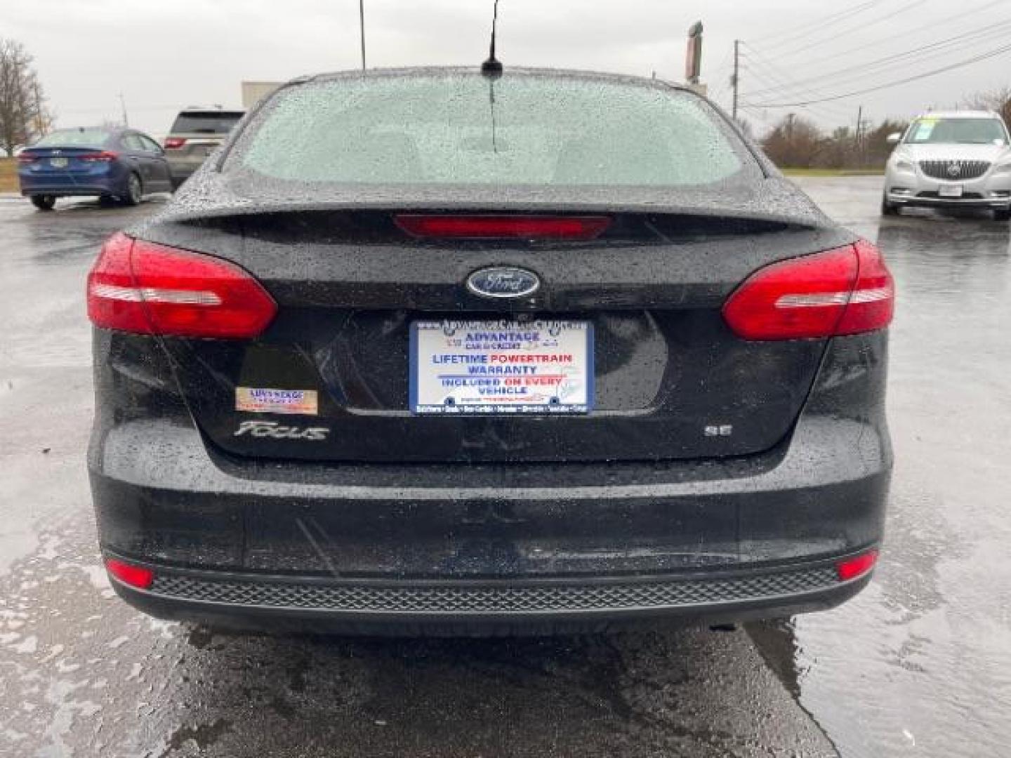 2017 Shadow Black Ford Focus SE Sedan (1FADP3F23HL) with an 2.0L L4 DOHC 16V engine, located at 1099 N County Rd 25A , Troy, OH, 45373, (937) 908-9800, 40.057079, -84.212883 - Photo#3