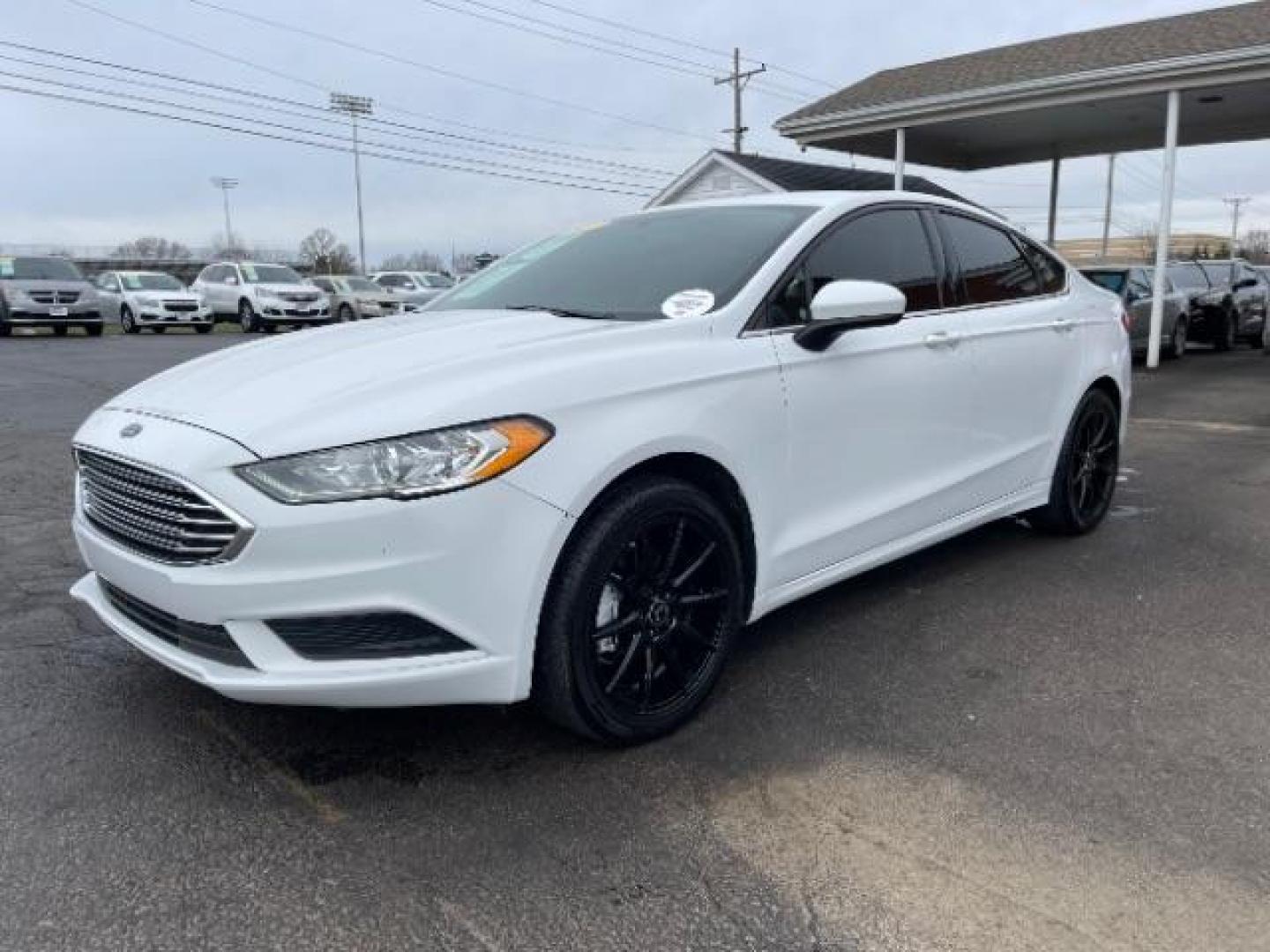 2017 White Gold Ford Fusion S (3FA6P0G7XHR) with an 2.5L L4 DOHC 16V engine, 6-Speed Automatic transmission, located at 1184 Kauffman Ave, Fairborn, OH, 45324, (937) 908-9800, 39.807072, -84.030914 - Photo#1