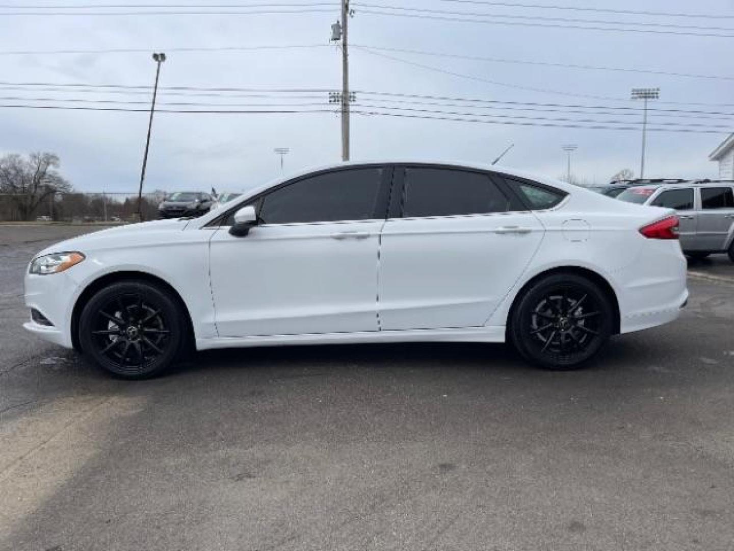 2017 White Gold Ford Fusion S (3FA6P0G7XHR) with an 2.5L L4 DOHC 16V engine, 6-Speed Automatic transmission, located at 1184 Kauffman Ave, Fairborn, OH, 45324, (937) 908-9800, 39.807072, -84.030914 - Photo#2