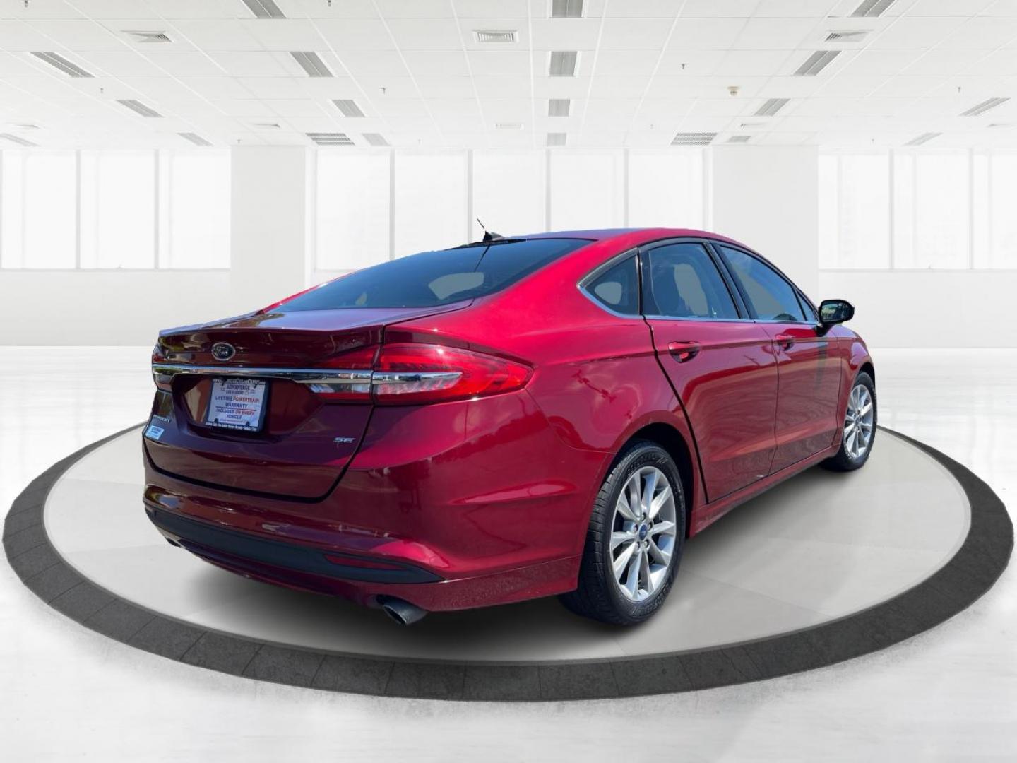 2017 Ruby Red Metallic Tinted Clearcoat Ford Fusion SE (3FA6P0H74HR) with an 2.5L L4 DOHC 16V engine, 6-Speed Automatic transmission, located at 1184 Kauffman Ave, Fairborn, OH, 45324, (937) 908-9800, 39.807072, -84.030914 - Photo#2