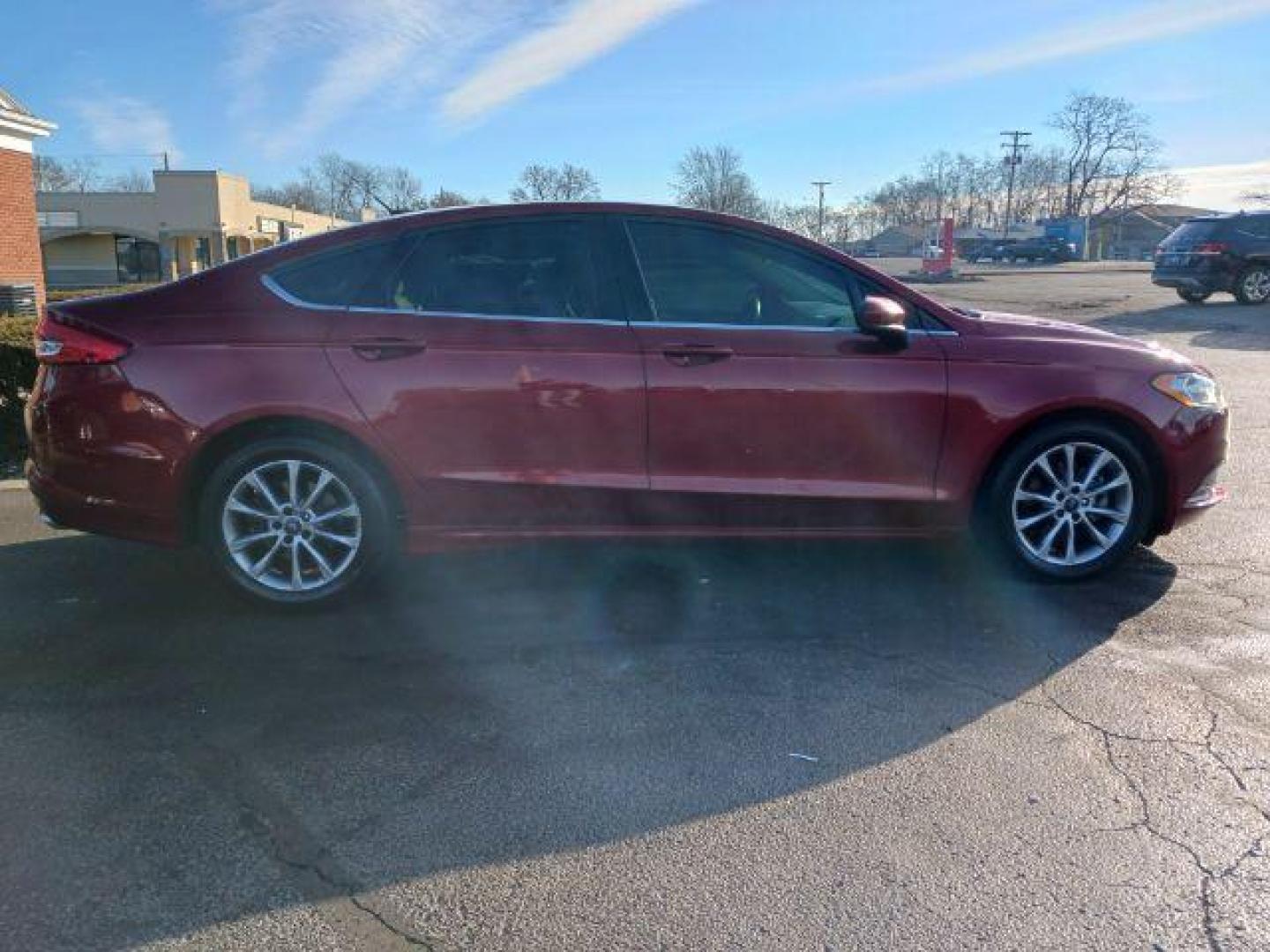 2017 Ruby Red Metallic Tinted Clearcoat Ford Fusion SE (3FA6P0H74HR) with an 2.5L L4 DOHC 16V engine, 6-Speed Automatic transmission, located at 1230 East Main St, Xenia, OH, 45385, (937) 908-9800, 39.688026, -83.910172 - Photo#4