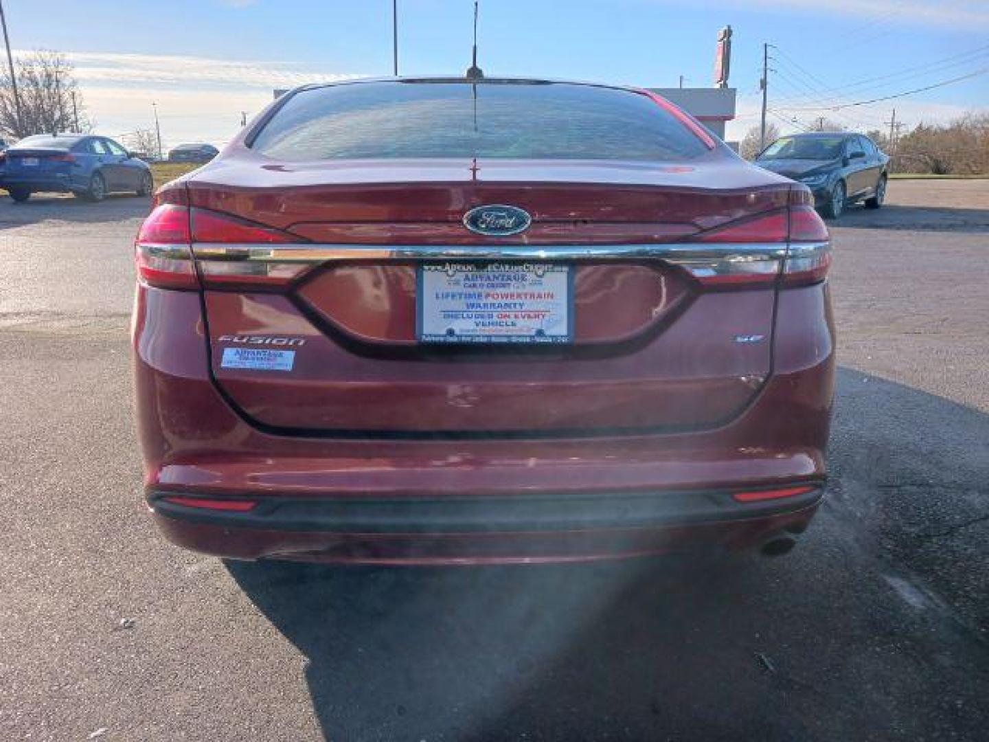 2017 Ruby Red Metallic Tinted Clearcoat Ford Fusion SE (3FA6P0H74HR) with an 2.5L L4 DOHC 16V engine, 6-Speed Automatic transmission, located at 1230 East Main St, Xenia, OH, 45385, (937) 908-9800, 39.688026, -83.910172 - Photo#5