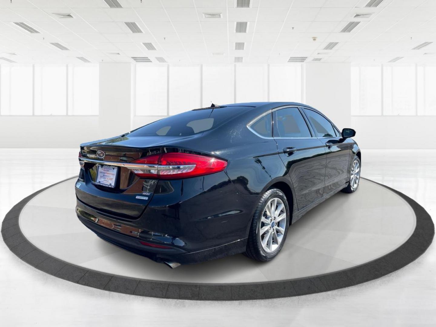 2017 Shadow Black Ford Fusion SE (3FA6P0HD1HR) with an 1.5L L4 DOHC 16V engine, 6A transmission, located at 1230 East Main St, Xenia, OH, 45385, (937) 908-9800, 39.688026, -83.910172 - Photo#2