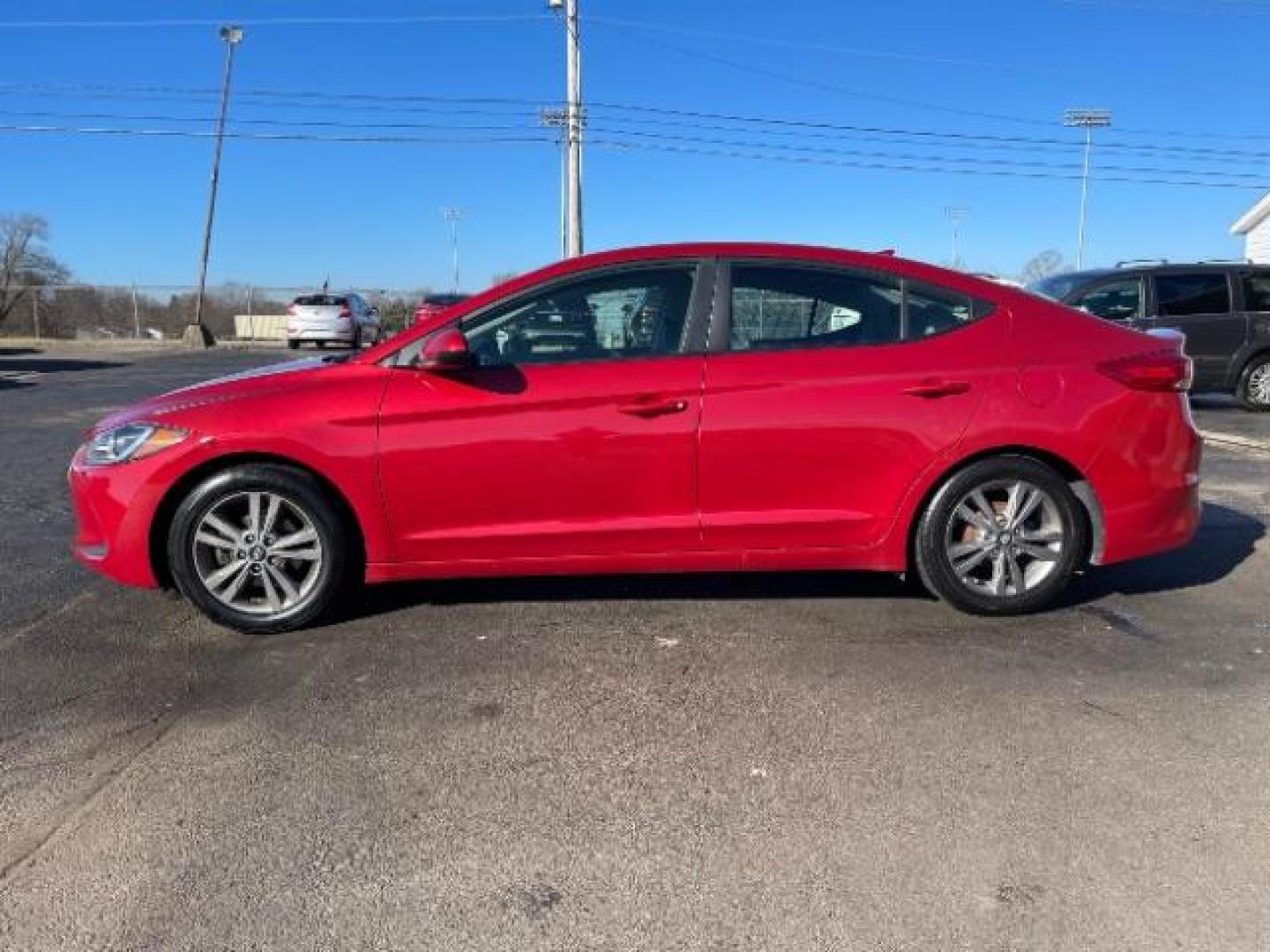 2017 Red Hyundai Elantra SE (5NPD84LF1HH) , Auto transmission, located at 4508 South Dixie Dr, Moraine, OH, 45439, (937) 908-9800, 39.689976, -84.218452 - Photo#2