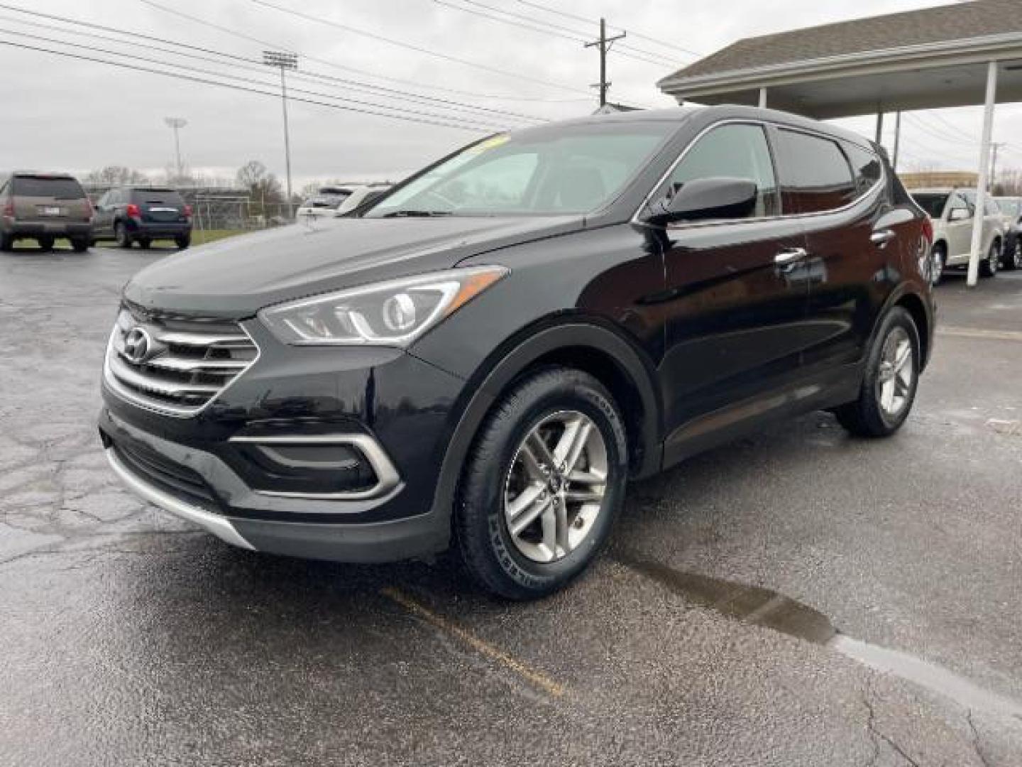 2017 Twilight Black Hyundai Santa Fe Sport 2.4 FWD (5XYZT3LBXHG) with an 2.4L L4 DOHC 16V engine, 6-Speed Automatic transmission, located at 1230 East Main St, Xenia, OH, 45385, (937) 908-9800, 39.688026, -83.910172 - Photo#1