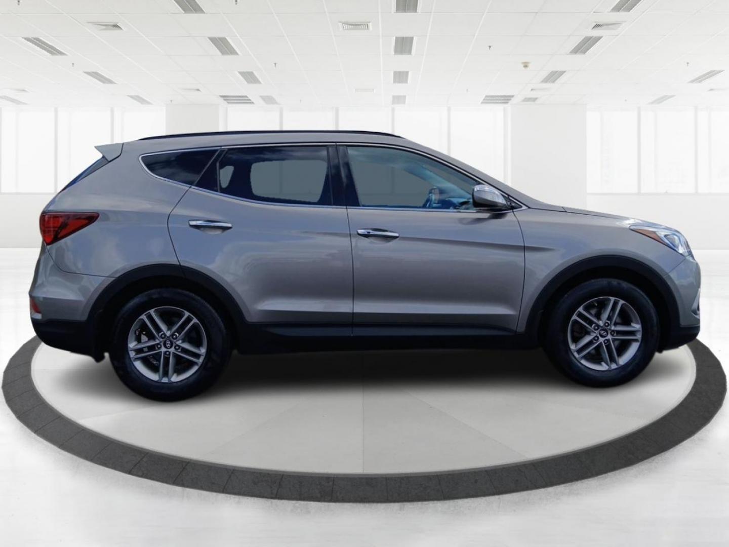 2017 Mineral Gray Hyundai Santa Fe Sport 2.4 FWD (5NMZU3LB7HH) with an 2.4L L4 DOHC 16V engine, 6A transmission, located at 880 E. National Road, Vandalia, OH, 45377, (937) 908-9800, 39.891918, -84.183594 - Photo#1