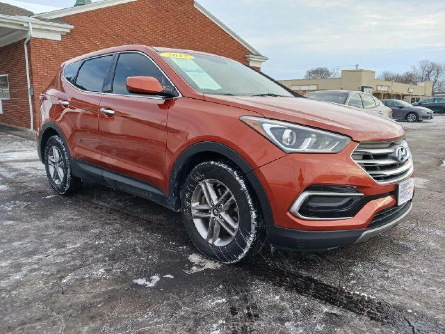 2017 Canyon Copper Hyundai Santa Fe Sport 2.4 AWD (5XYZTDLB2HG) with an 2.4L L4 DOHC 16V engine, 6-Speed Automatic transmission, located at 1184 Kauffman Ave, Fairborn, OH, 45324, (937) 908-9800, 39.807072, -84.030914 - Photo#0