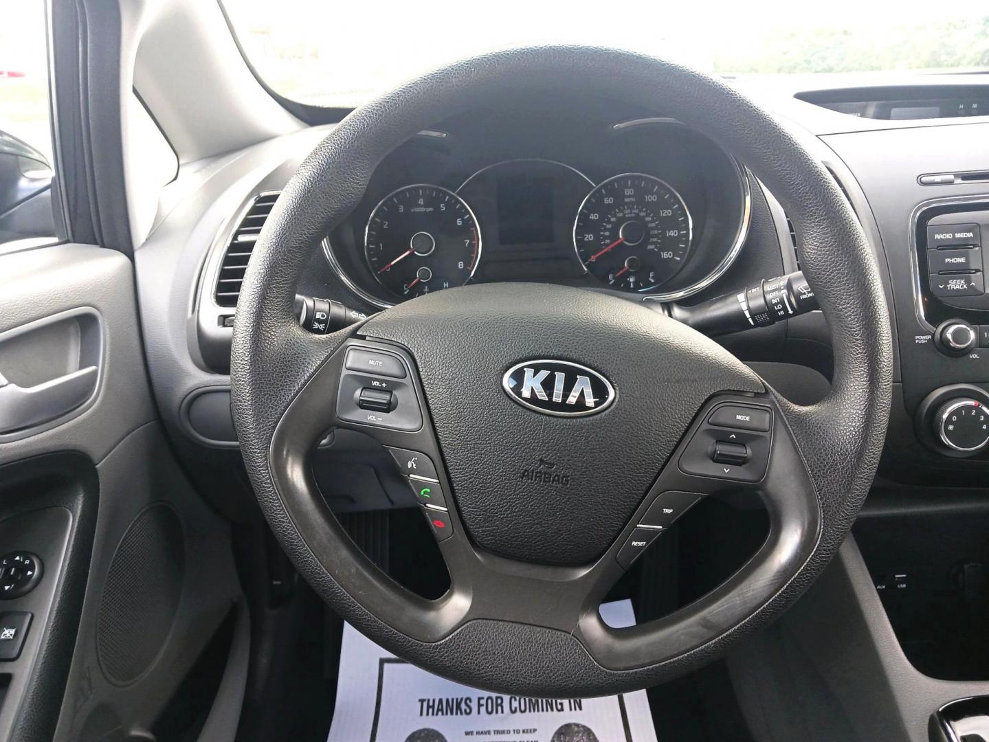 2017 Aurora Black Kia Forte LX 6A (3KPFK4A73HE) with an 2.0L L4 DOHC 16V engine, 6-Speed Automatic transmission, located at 880 E. National Road, Vandalia, OH, 45377, (937) 908-9800, 39.891918, -84.183594 - Photo#15