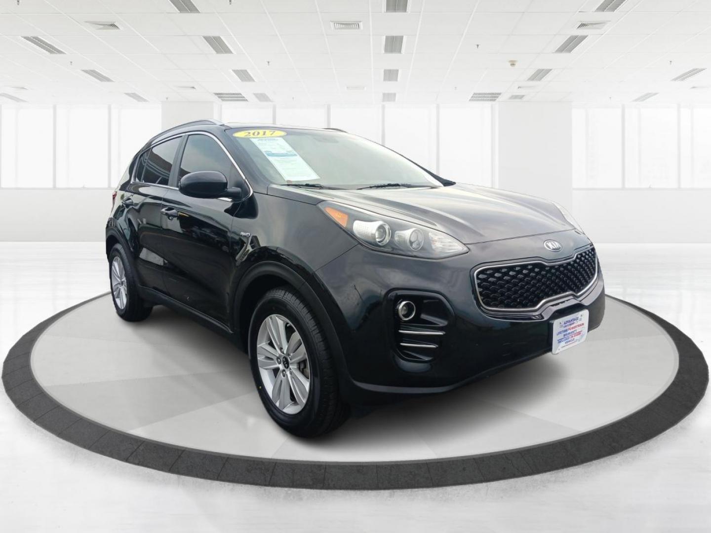 2017 Black Cherry Kia Sportage (KNDPMCAC8H7) with an 2.4L V6 DOHC 24V engine, 6-Speed Automatic transmission, located at 1951 S Dayton Lakeview Rd., New Carlisle, OH, 45344, (937) 908-9800, 39.890999, -84.050255 - Photo#0