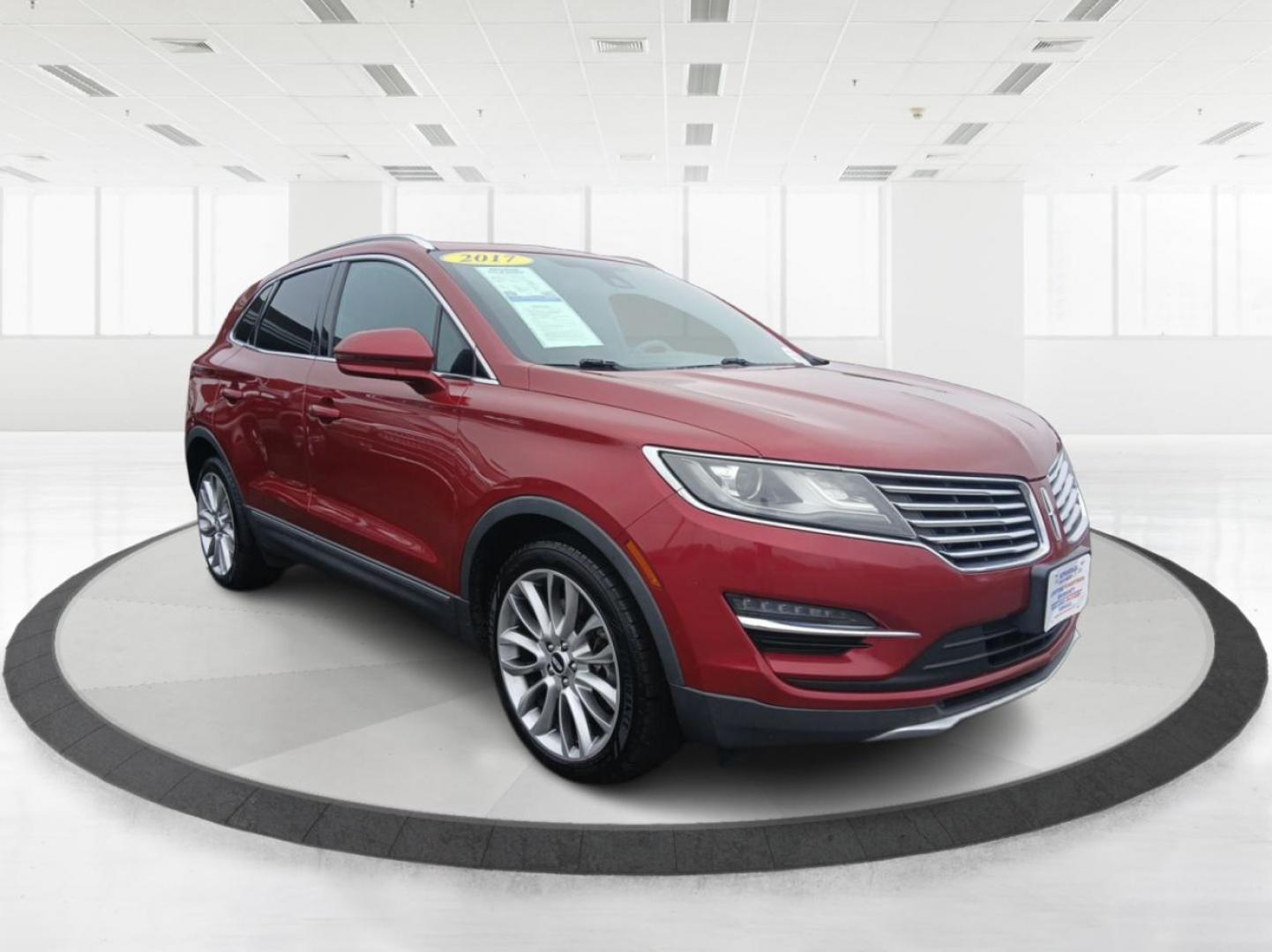 2017 Ruby Red Metallic Tinted Clearcoat Lincoln MKC Reserve FWD (5LMCJ3C92HU) with an 2.0L L4 DOHC 16V engine, 6A transmission, located at 880 E. National Road, Vandalia, OH, 45377, (937) 908-9800, 39.891918, -84.183594 - Photo#0