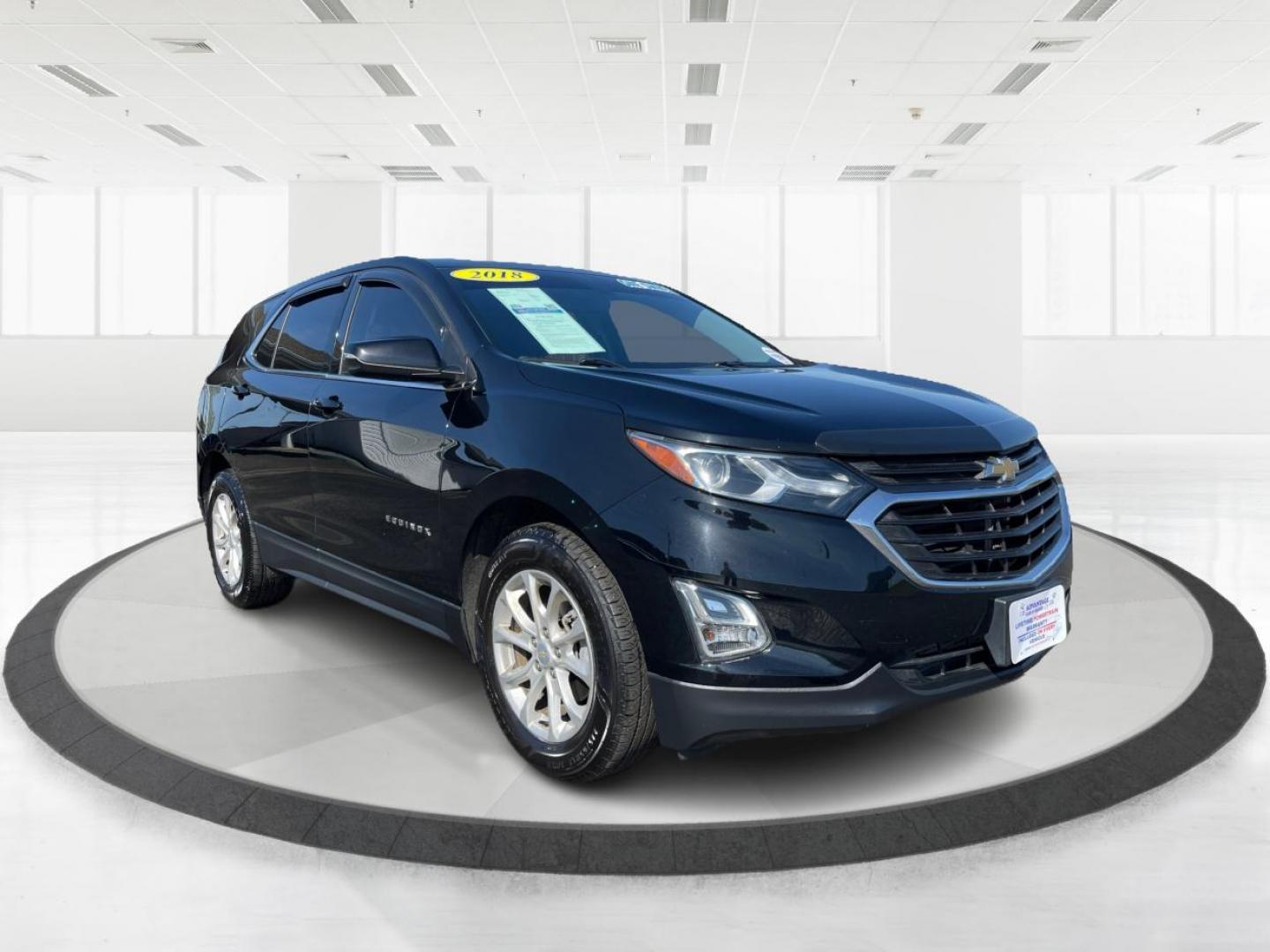 2018 Mosaic Black Metallic Chevrolet Equinox LT 2WD (2GNAXJEV1J6) with an 1.5L L4 DIR DOHC 16V TURBO engine, 6-Speed Automatic transmission, located at 4508 South Dixie Dr, Moraine, OH, 45439, (937) 908-9800, 39.689976, -84.218452 - Photo#0