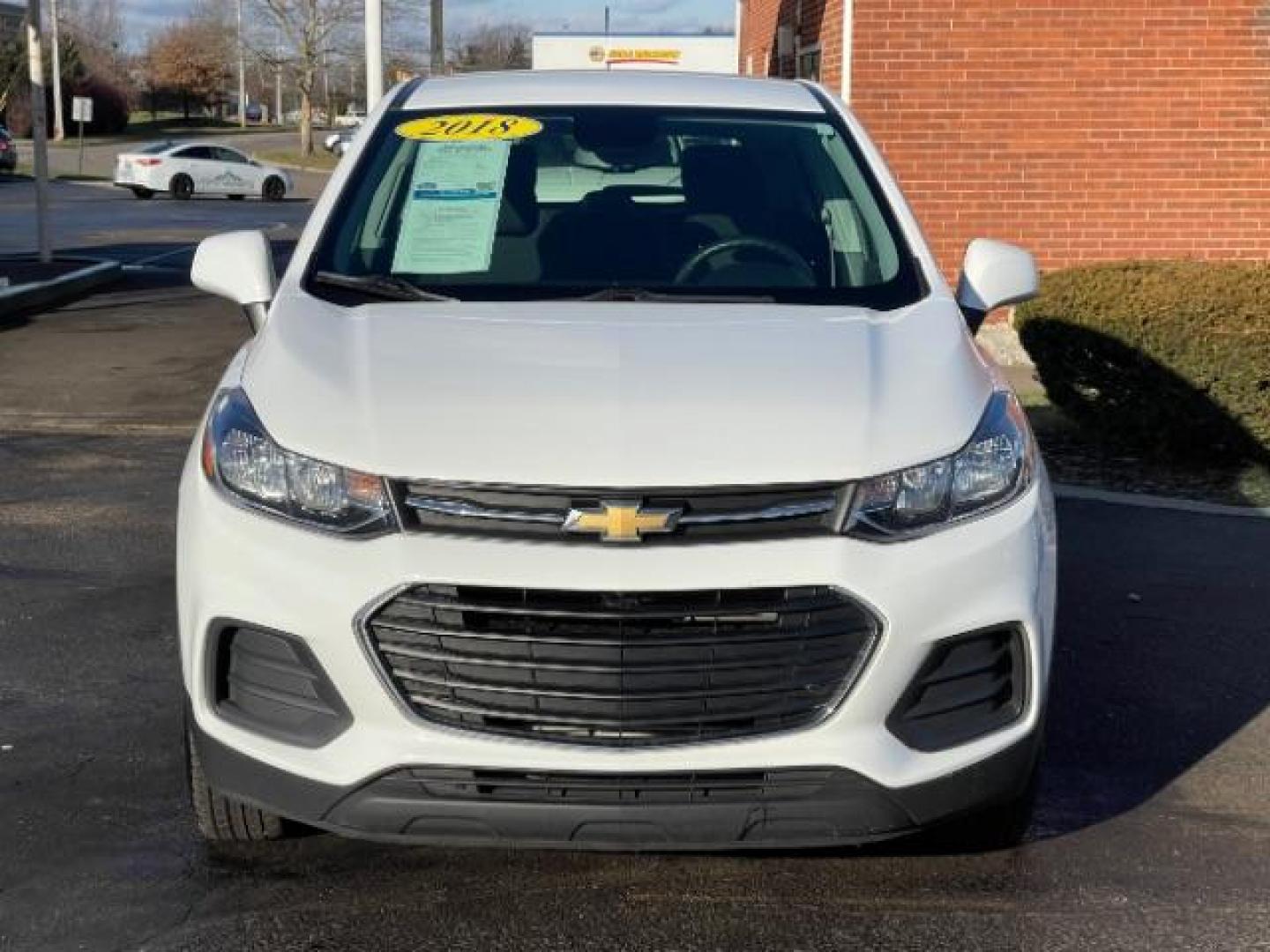 2018 Summit White Chevrolet Trax LS AWD (KL7CJNSB5JB) with an 1.4L L4 DOHC 16V engine, 6-Speed Automatic transmission, located at 1184 Kauffman Ave, Fairborn, OH, 45324, (937) 908-9800, 39.807072, -84.030914 - Photo#4