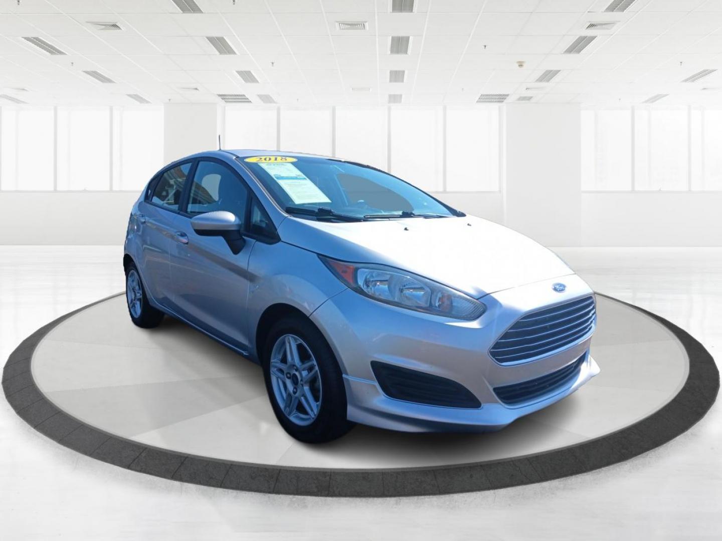 2018 Ingot Silver Metallic Ford Fiesta SE Hatchback (3FADP4EJ5JM) with an 1.6L L4 DOHC 16V engine, located at 1230 East Main St, Xenia, OH, 45385, (937) 908-9800, 39.688026, -83.910172 - Photo#0