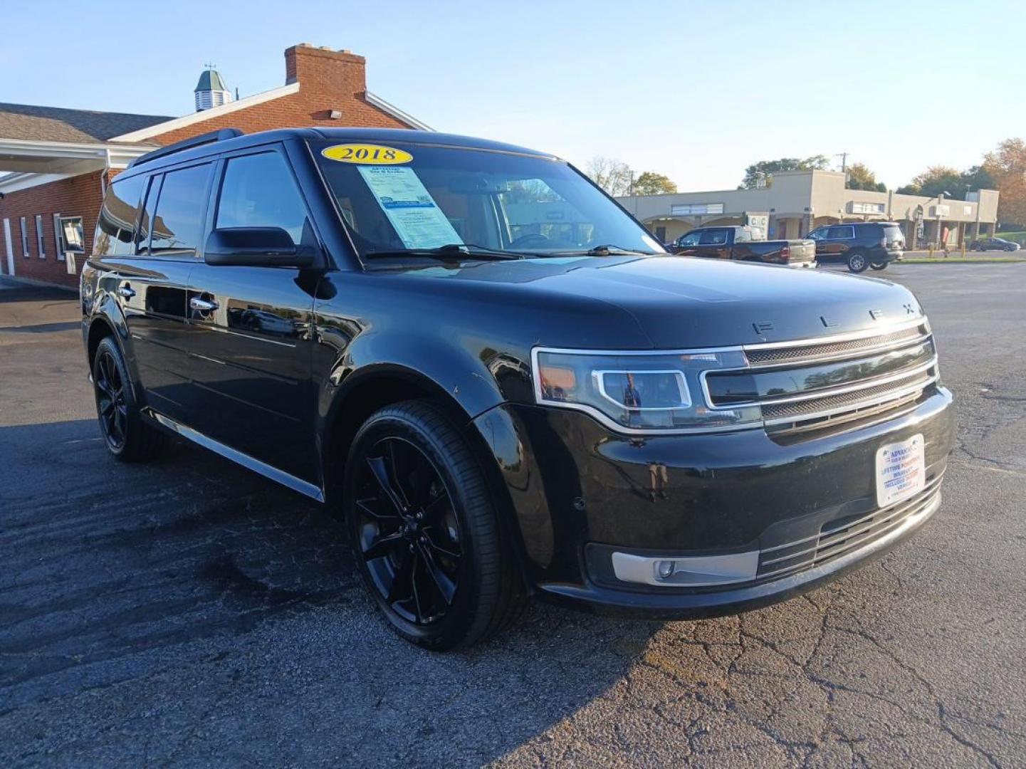 2018 Shadow Black Ford Flex Limited AWD (2FMHK6D8XJB) with an 3.5L V6 DOHC 24V engine, 6A transmission, located at 880 E. National Road, Vandalia, OH, 45377, (937) 908-9800, 39.891918, -84.183594 - Photo#0