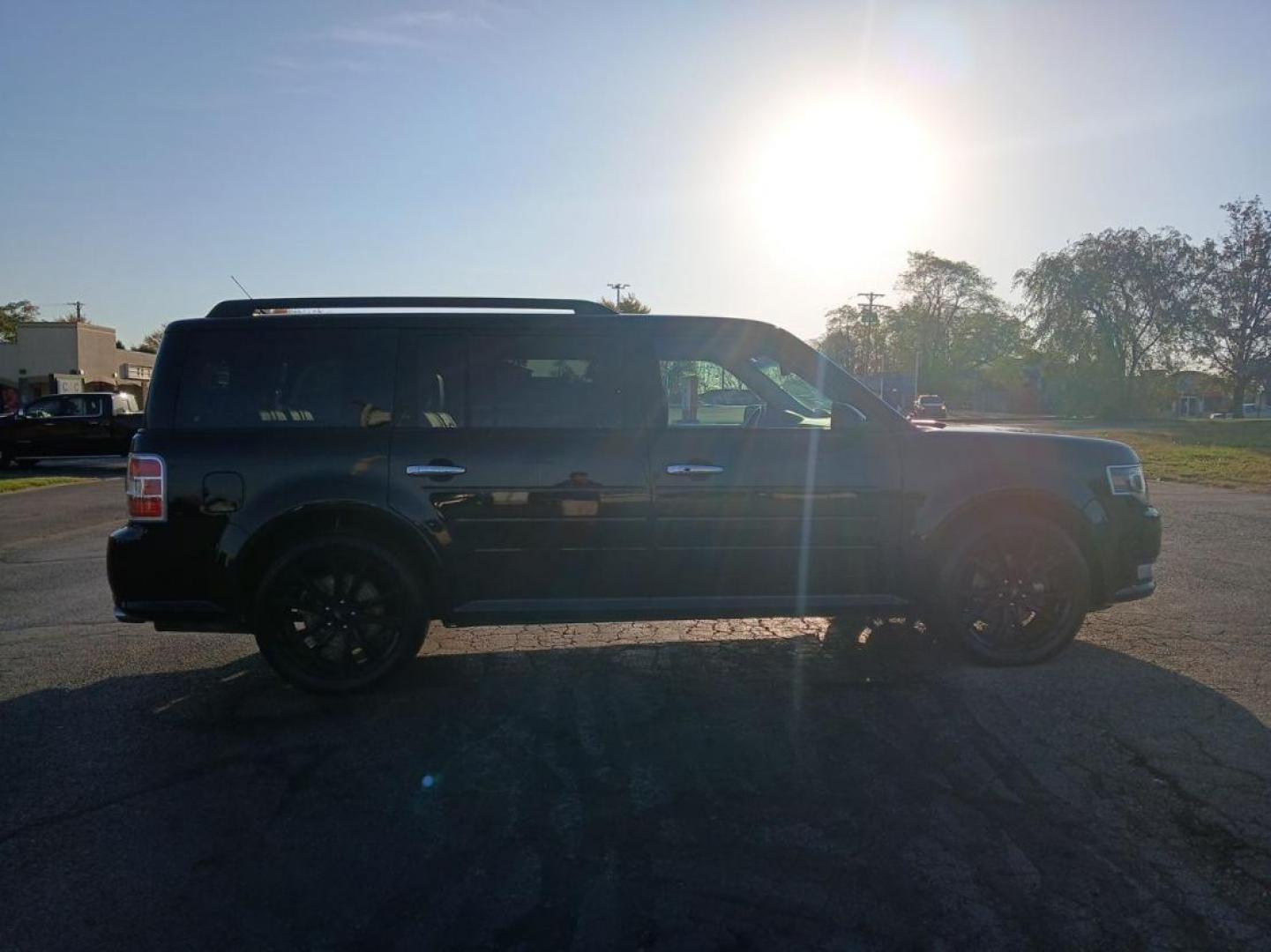 2018 Shadow Black Ford Flex Limited AWD (2FMHK6D8XJB) with an 3.5L V6 DOHC 24V engine, 6A transmission, located at 880 E. National Road, Vandalia, OH, 45377, (937) 908-9800, 39.891918, -84.183594 - Photo#1