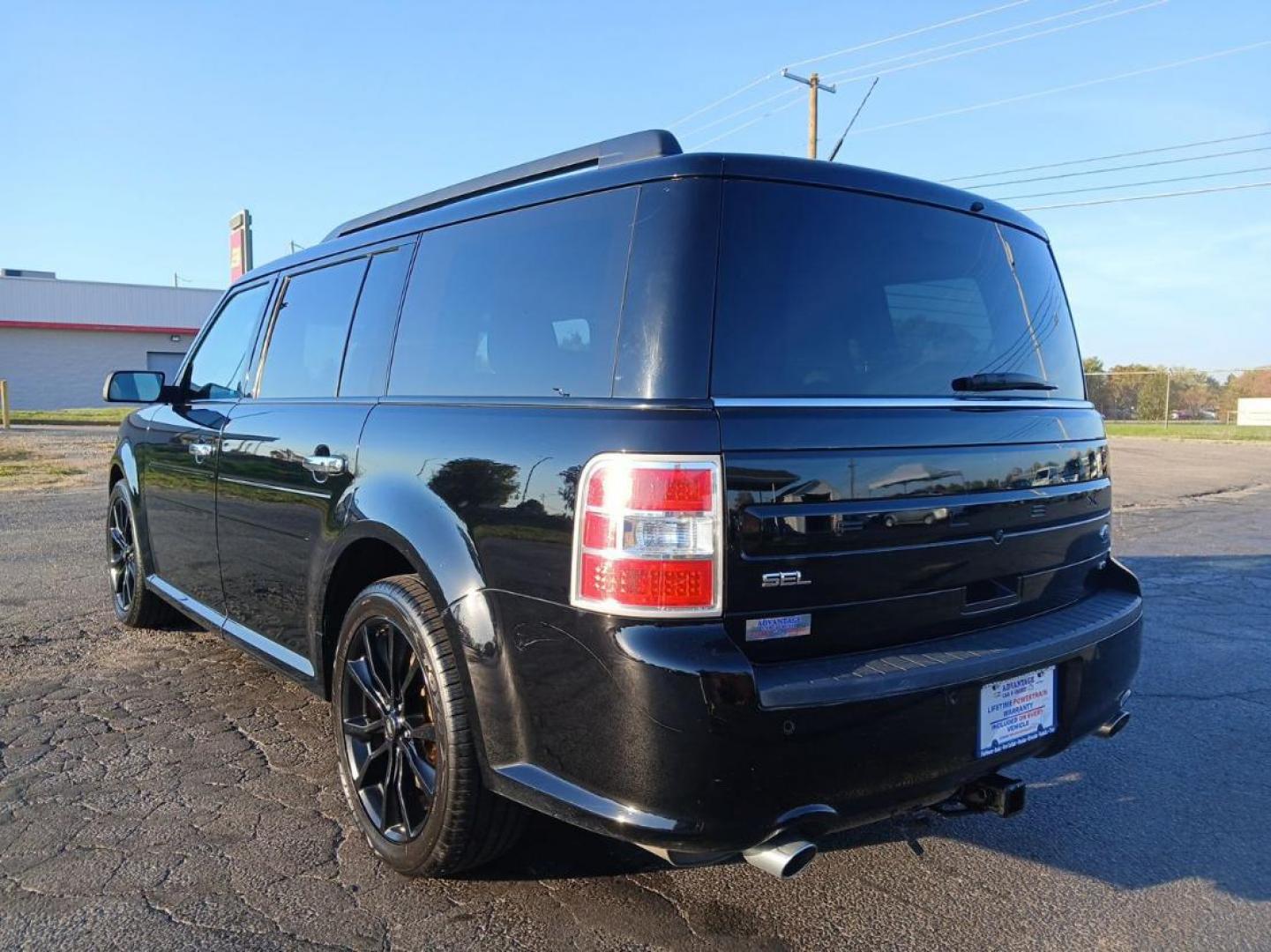 2018 Shadow Black Ford Flex Limited AWD (2FMHK6D8XJB) with an 3.5L V6 DOHC 24V engine, 6A transmission, located at 880 E. National Road, Vandalia, OH, 45377, (937) 908-9800, 39.891918, -84.183594 - Photo#4