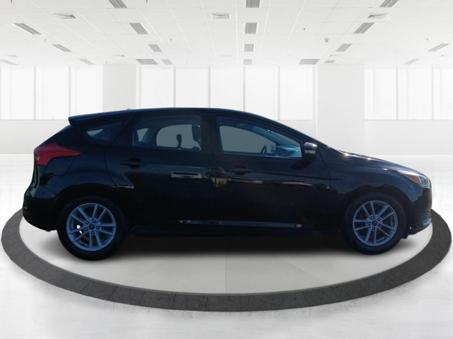 2018 Shadow Black Ford Focus SE Hatch (1FADP3K20JL) with an 2.0L L4 DOHC 16V engine, located at 1951 S Dayton Lakeview Rd., New Carlisle, OH, 45344, (937) 908-9800, 39.890999, -84.050255 - Photo#1