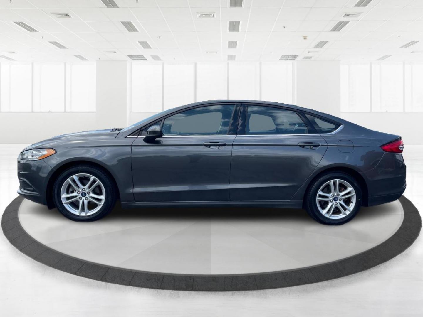 2018 Magnetic Metallic Ford Fusion SE (3FA6P0HD2JR) with an 1.5L L4 DOHC 16V engine, 6A transmission, located at 1099 N County Rd 25A , Troy, OH, 45373, (937) 908-9800, 40.057079, -84.212883 - Photo#5