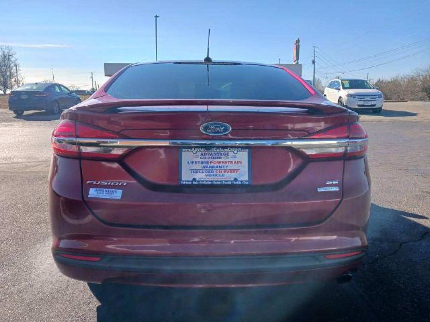 2018 Burgundy Velvet Metallic Tinted Clearcoat Ford Fusion SE (3FA6P0HDXJR) with an 1.5L L4 DOHC 16V engine, 6-Speed Automatic transmission, located at 1230 East Main St, Xenia, OH, 45385, (937) 908-9800, 39.688026, -83.910172 - Photo#5