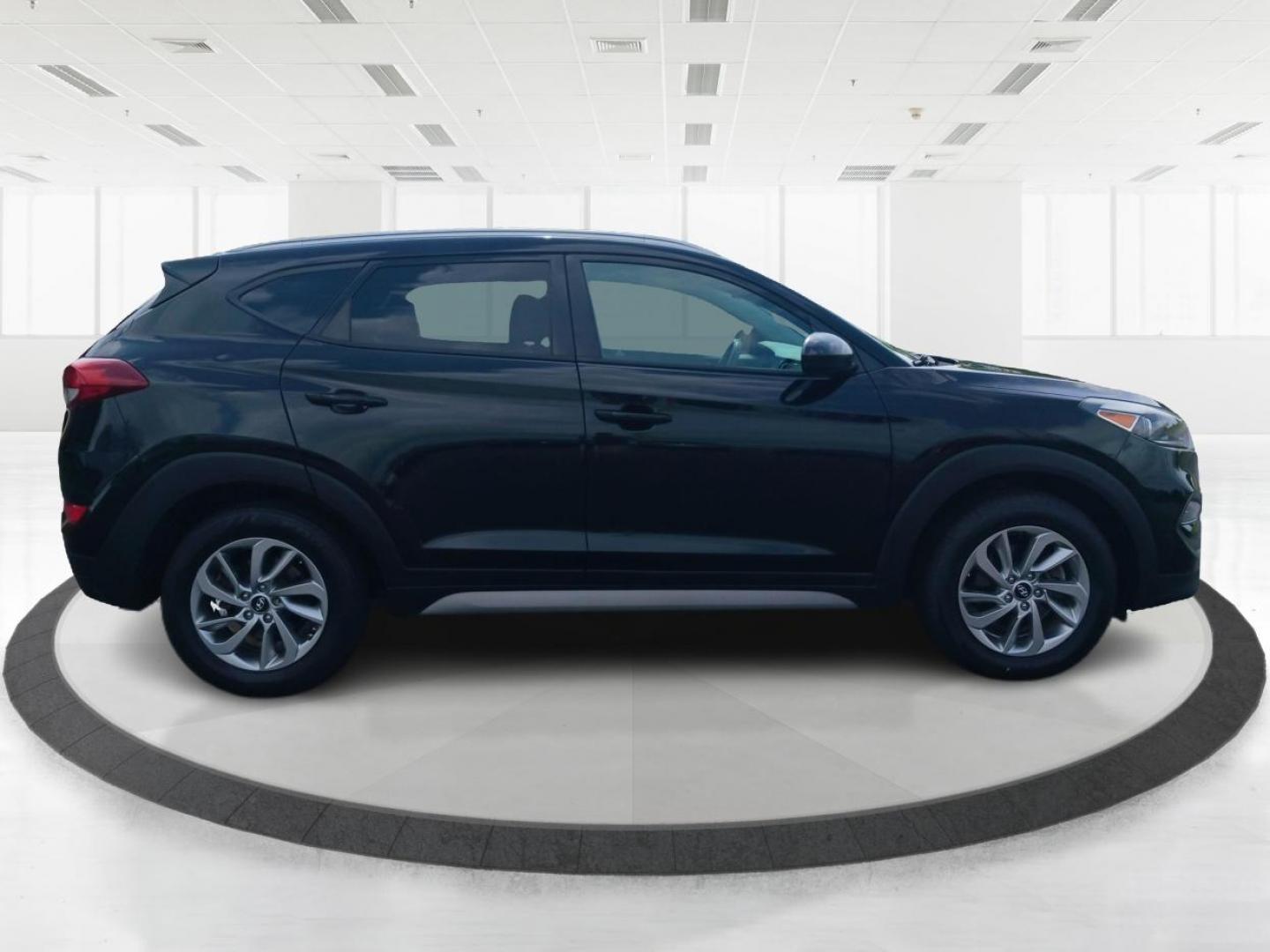 2018 Black Noir Pearl Hyundai Tucson SEL AWD (KM8J3CA40JU) with an 2.0L L4 DOHC 16V engine, 6-Speed Automatic transmission, located at 1184 Kauffman Ave, Fairborn, OH, 45324, (937) 908-9800, 39.807072, -84.030914 - Photo#1