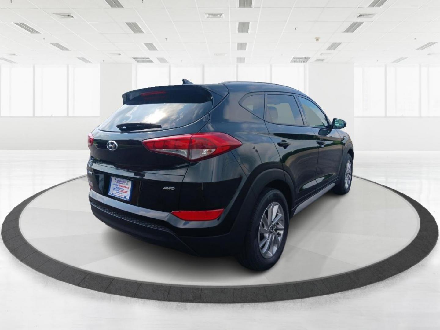 2018 Black Noir Pearl Hyundai Tucson SEL AWD (KM8J3CA40JU) with an 2.0L L4 DOHC 16V engine, 6-Speed Automatic transmission, located at 1184 Kauffman Ave, Fairborn, OH, 45324, (937) 908-9800, 39.807072, -84.030914 - Photo#2