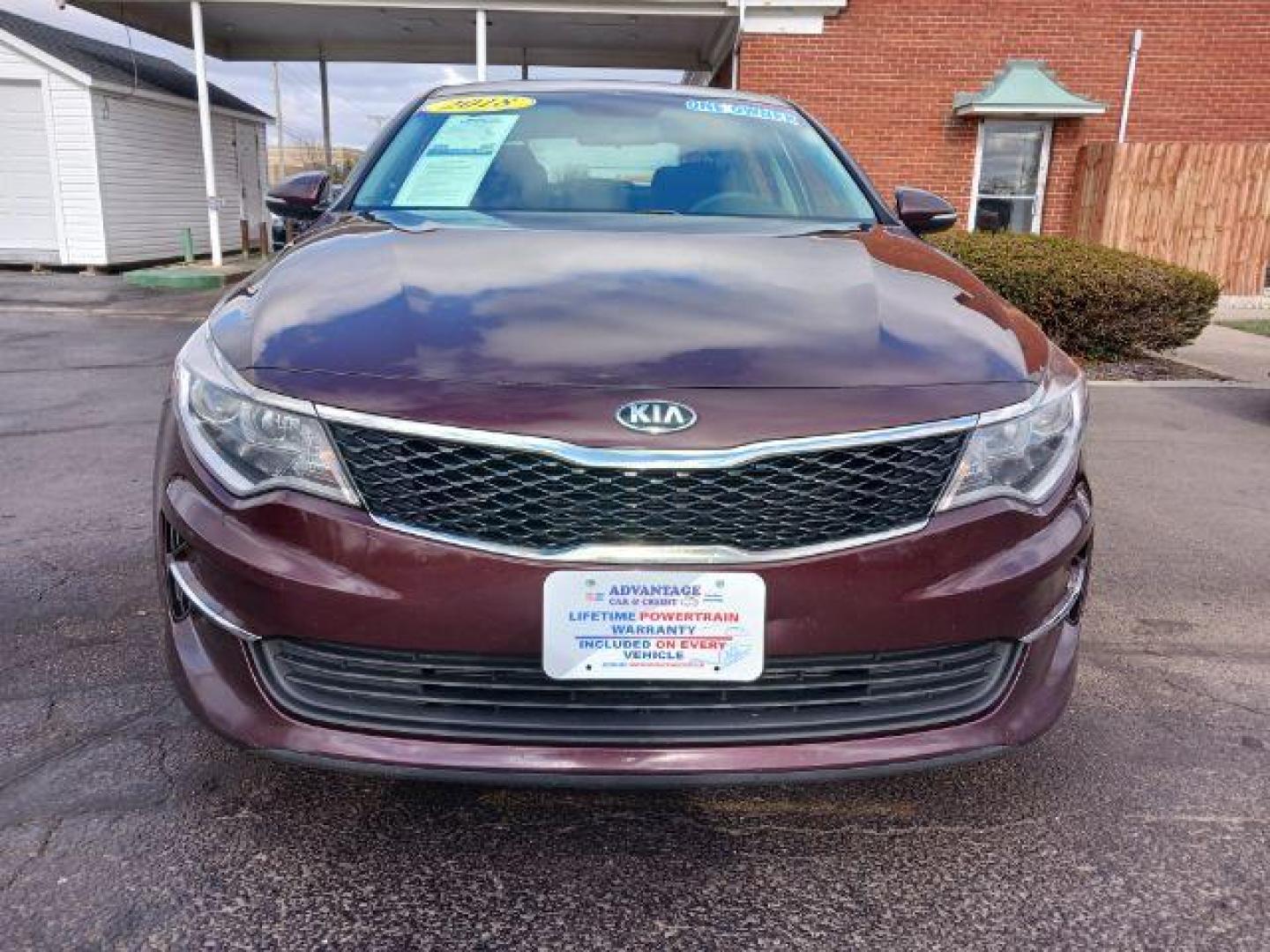 2018 Sangria Kia Optima LX (5XXGT4L34JG) with an 2.4L L4 DOHC 16V engine, 6-Speed Automatic transmission, located at 4508 South Dixie Dr, Moraine, OH, 45439, (937) 908-9800, 39.689976, -84.218452 - Photo#1