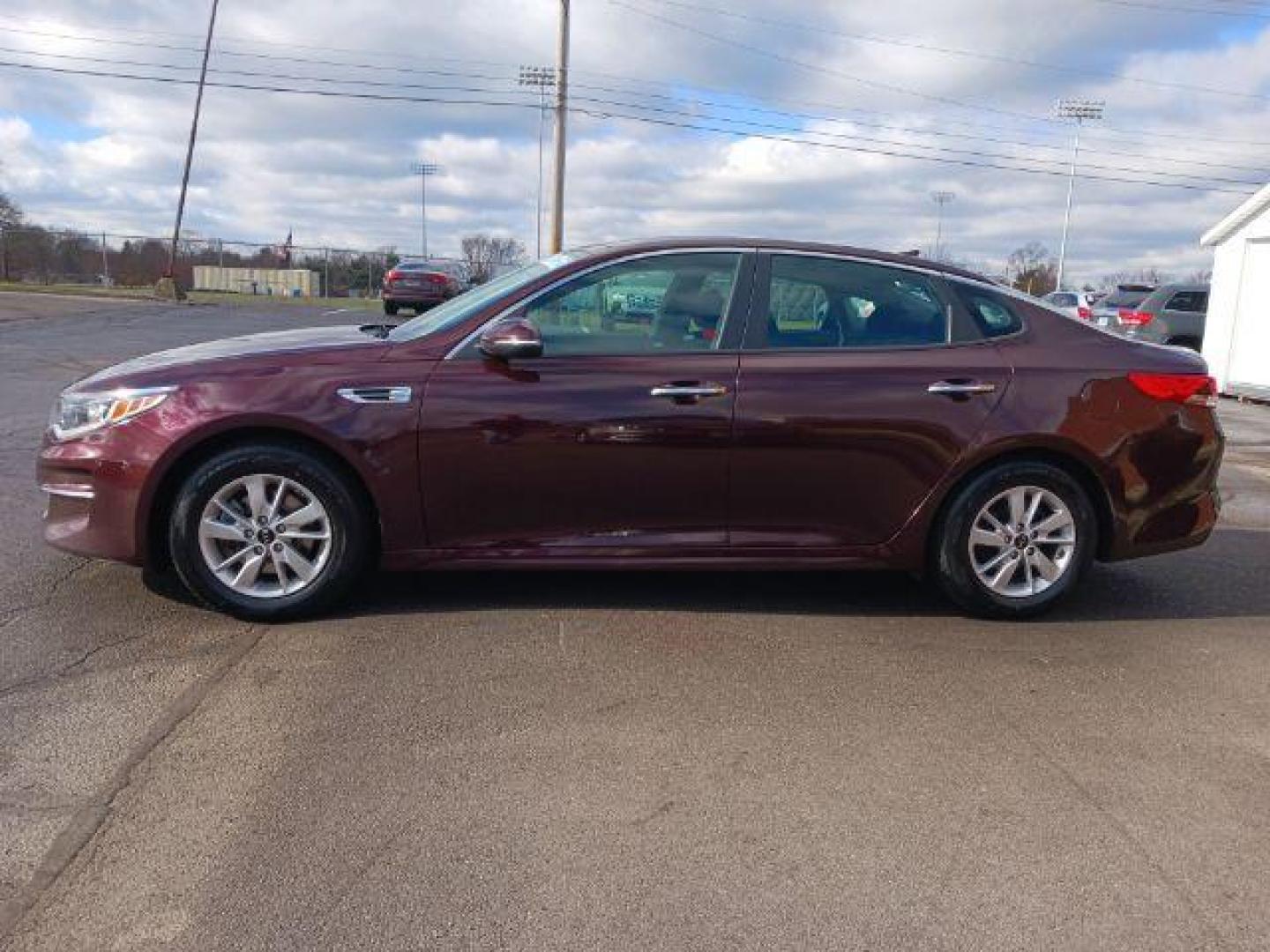 2018 Sangria Kia Optima LX (5XXGT4L34JG) with an 2.4L L4 DOHC 16V engine, 6-Speed Automatic transmission, located at 4508 South Dixie Dr, Moraine, OH, 45439, (937) 908-9800, 39.689976, -84.218452 - Photo#3