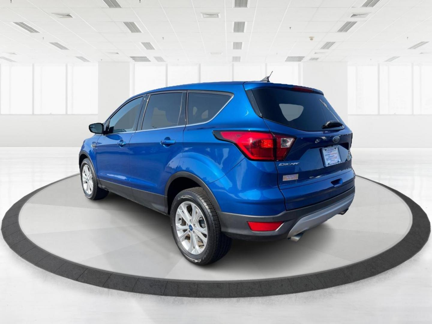 2019 Lightning Blue Metallic Ford Escape (1FMCU9GD8KU) with an 1.5L L4 DOHC 16V engine, 6-Speed Automatic transmission, located at 4508 South Dixie Dr, Moraine, OH, 45439, (937) 908-9800, 39.689976, -84.218452 - Photo#4