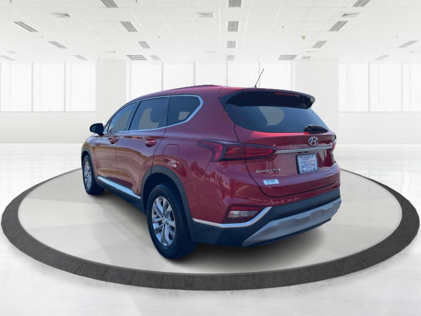 2019 Scarlet Red Hyundai Santa Fe (5NMS2CAD9KH) with an 2.4L L4 DOHC 16V engine, 8-Speed Automatic transmission, located at 1230 East Main St, Xenia, OH, 45385, (937) 908-9800, 39.688026, -83.910172 - Photo#4