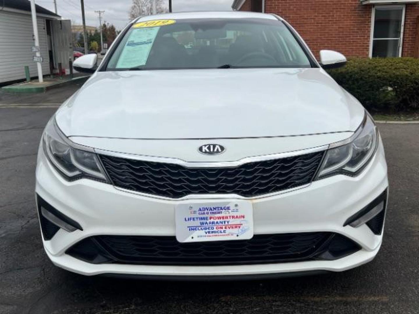 2019 Snow White Pearl Kia Optima LX (5XXGT4L30KG) with an 2.4L L4 DOHC 16V engine, 6-Speed Automatic transmission, located at 880 E. National Road, Vandalia, OH, 45377, (937) 908-9800, 39.891918, -84.183594 - Photo#1