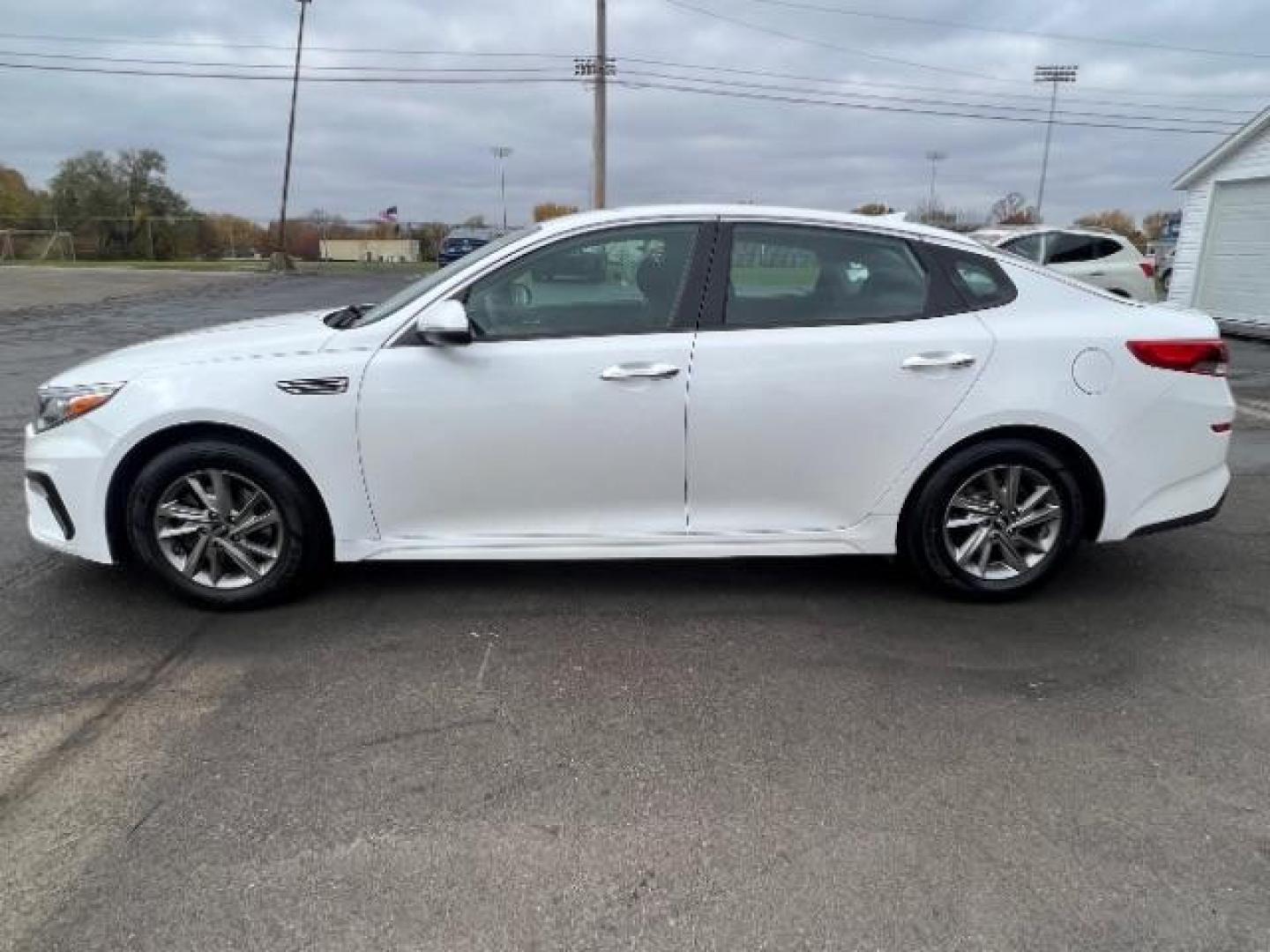 2019 Snow White Pearl Kia Optima LX (5XXGT4L30KG) with an 2.4L L4 DOHC 16V engine, 6-Speed Automatic transmission, located at 880 E. National Road, Vandalia, OH, 45377, (937) 908-9800, 39.891918, -84.183594 - Photo#3