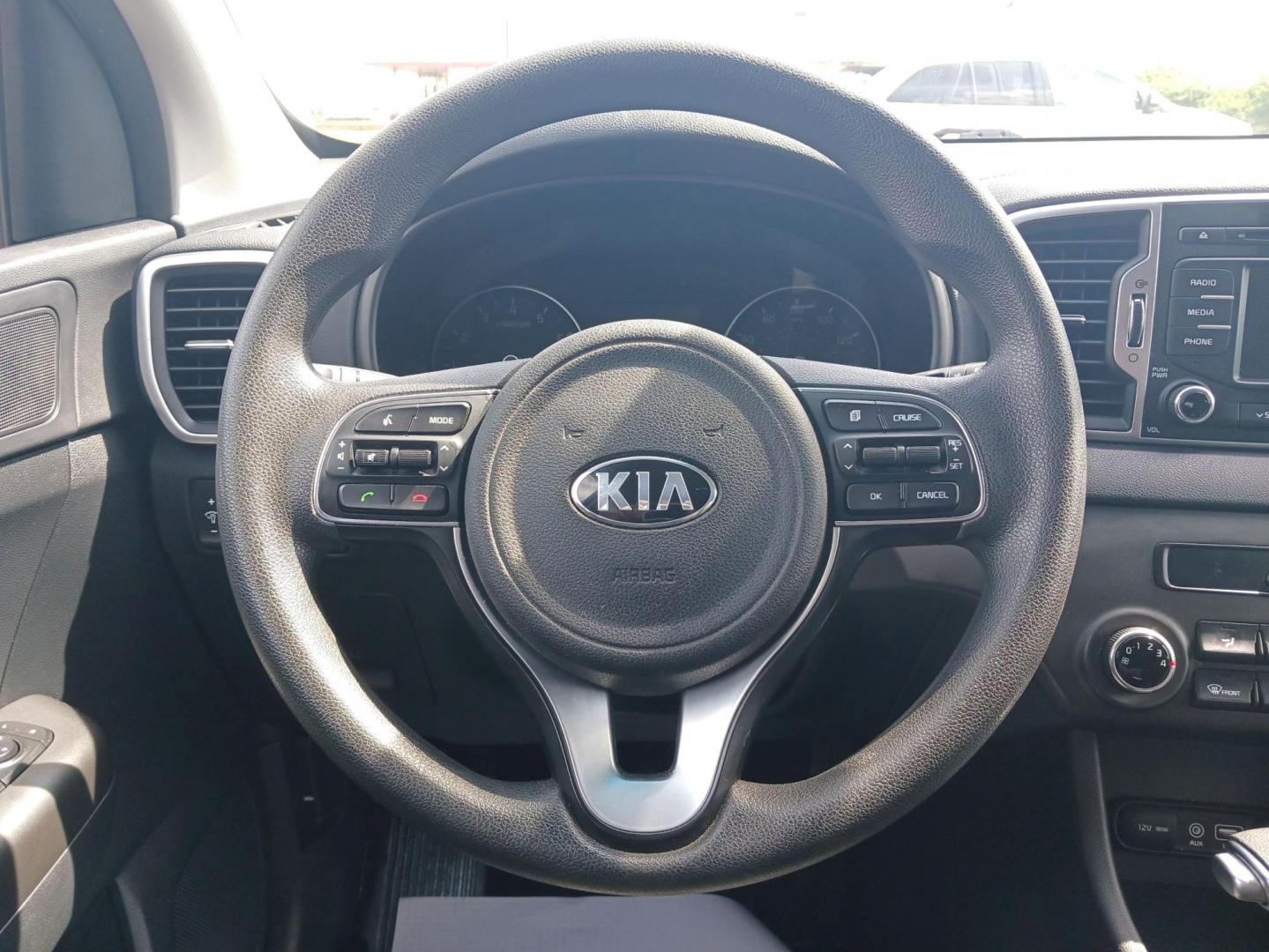 2019 Hyper Red Kia Sportage LX FWD (KNDPM3AC9K7) with an 2.4L V6 DOHC 24V engine, 6-Speed Automatic transmission, located at 1099 N County Rd 25A , Troy, OH, 45373, (937) 908-9800, 40.057079, -84.212883 - Photo#15