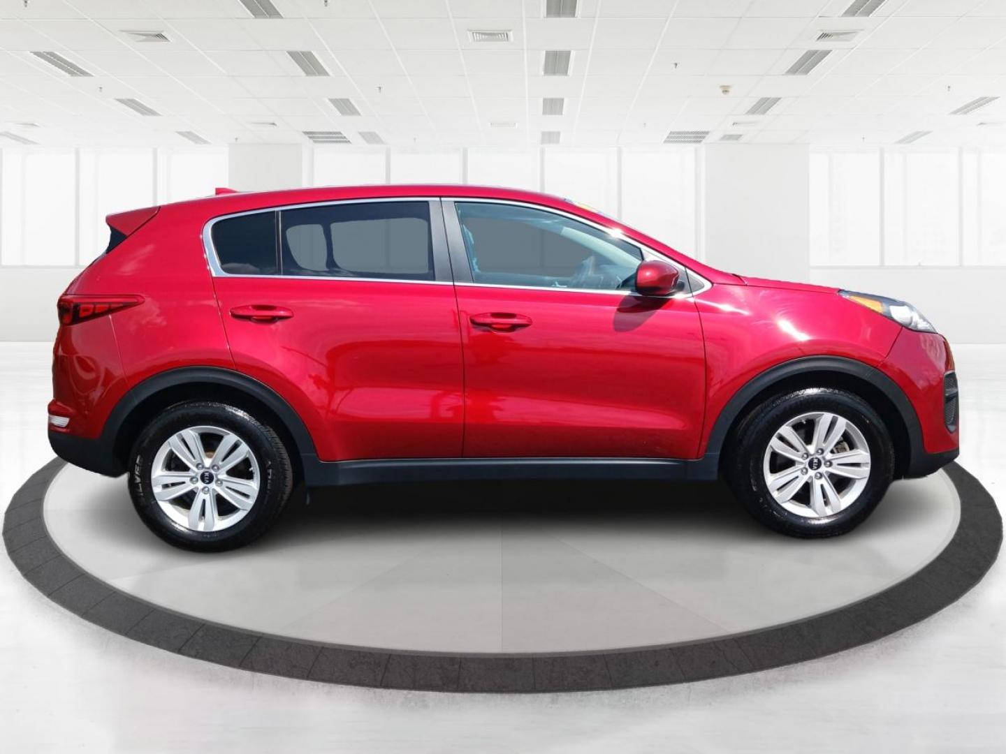 2019 Hyper Red Kia Sportage LX FWD (KNDPM3AC9K7) with an 2.4L V6 DOHC 24V engine, 6-Speed Automatic transmission, located at 1099 N County Rd 25A , Troy, OH, 45373, (937) 908-9800, 40.057079, -84.212883 - Photo#1