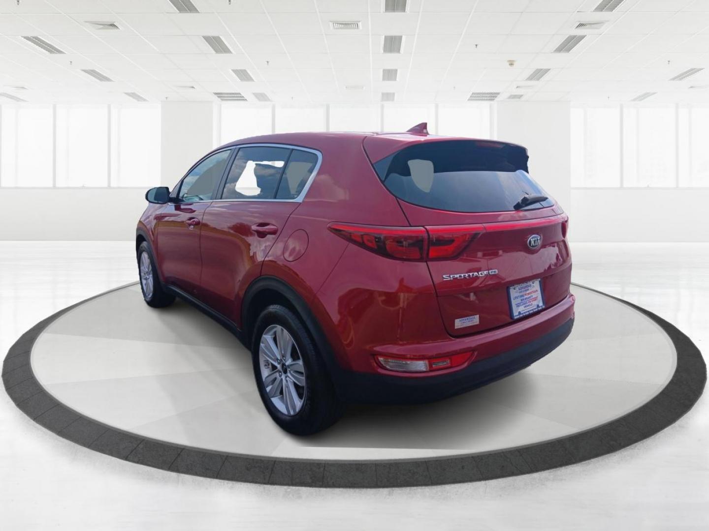 2019 Hyper Red Kia Sportage LX FWD (KNDPM3AC9K7) with an 2.4L V6 DOHC 24V engine, 6-Speed Automatic transmission, located at 1099 N County Rd 25A , Troy, OH, 45373, (937) 908-9800, 40.057079, -84.212883 - Photo#4