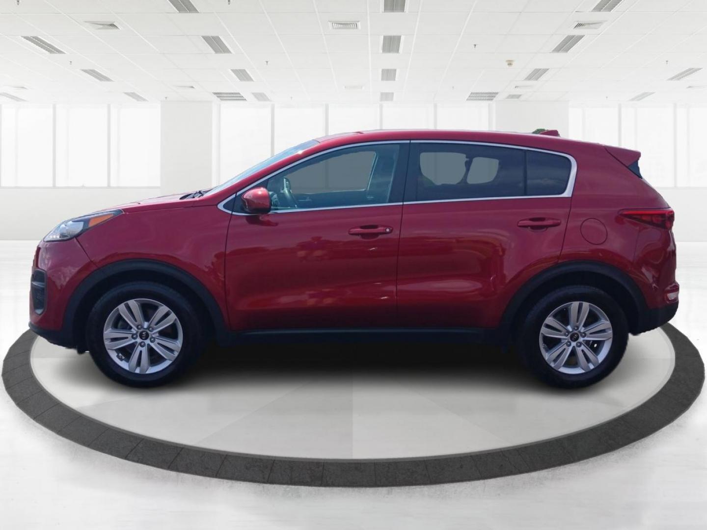 2019 Hyper Red Kia Sportage LX FWD (KNDPM3AC9K7) with an 2.4L V6 DOHC 24V engine, 6-Speed Automatic transmission, located at 1099 N County Rd 25A , Troy, OH, 45373, (937) 908-9800, 40.057079, -84.212883 - Photo#5