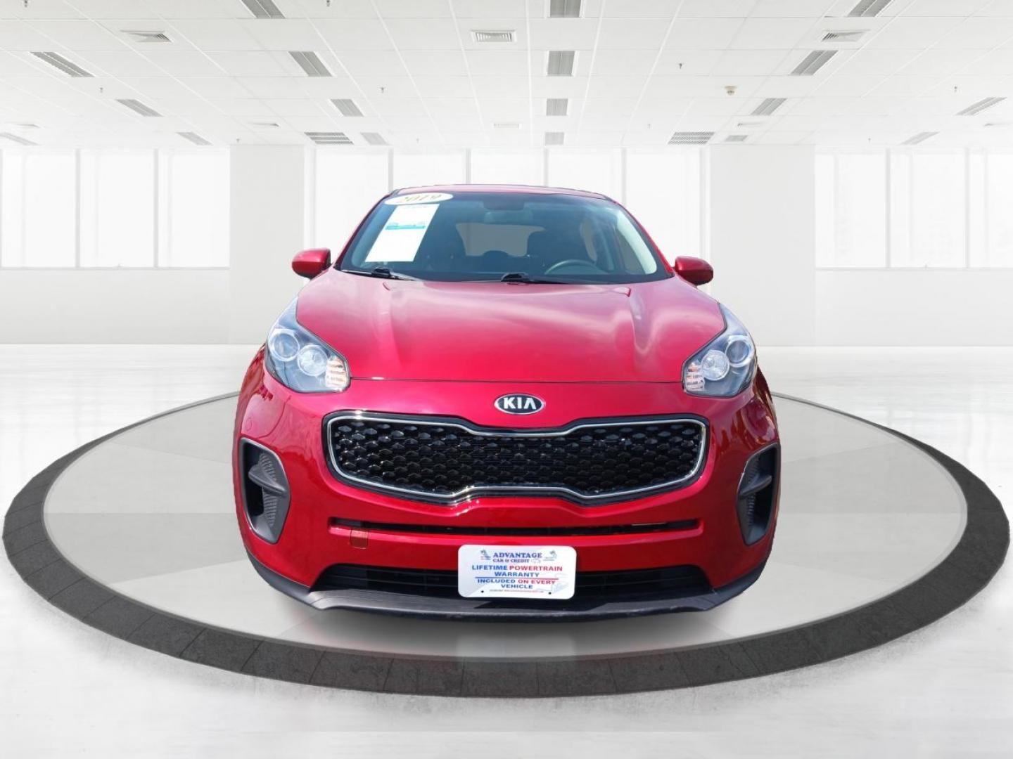 2019 Hyper Red Kia Sportage LX FWD (KNDPM3AC9K7) with an 2.4L V6 DOHC 24V engine, 6-Speed Automatic transmission, located at 1099 N County Rd 25A , Troy, OH, 45373, (937) 908-9800, 40.057079, -84.212883 - Photo#6