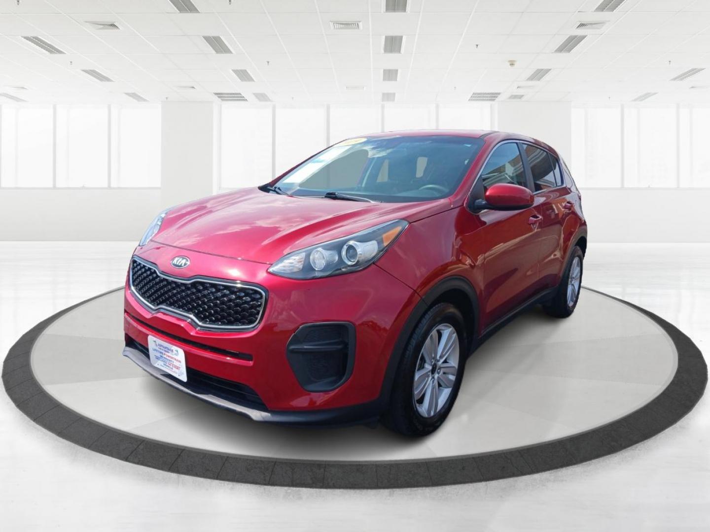 2019 Hyper Red Kia Sportage LX FWD (KNDPM3AC9K7) with an 2.4L V6 DOHC 24V engine, 6-Speed Automatic transmission, located at 1099 N County Rd 25A , Troy, OH, 45373, (937) 908-9800, 40.057079, -84.212883 - Photo#7